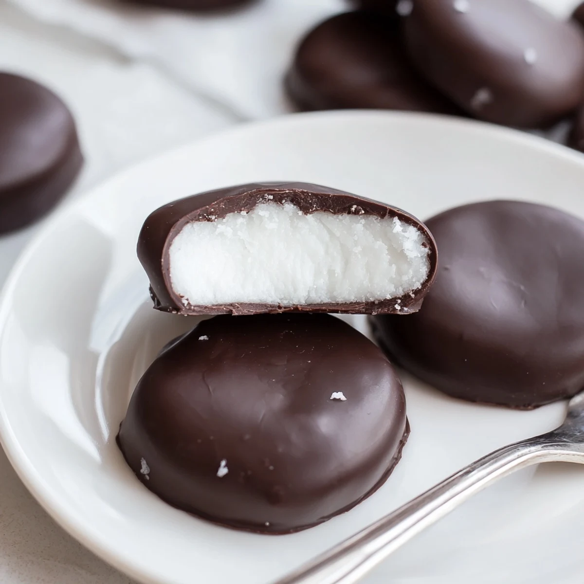 Hand stacked Peppermint Patties with creamy white filling, chilled and ready to gift