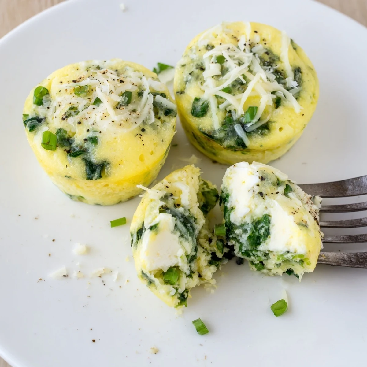 Savory Spinach Feta Egg Bites warm from the oven, perfect for meal prep.