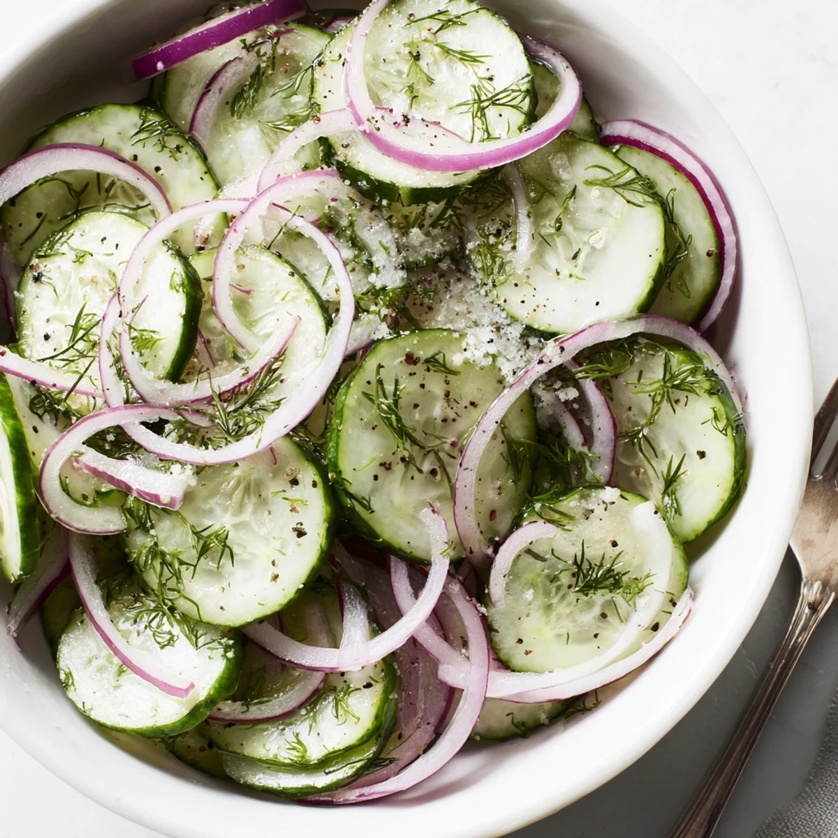 Cucumber Salad with fresh dill and red onion, crisp chilled side dish