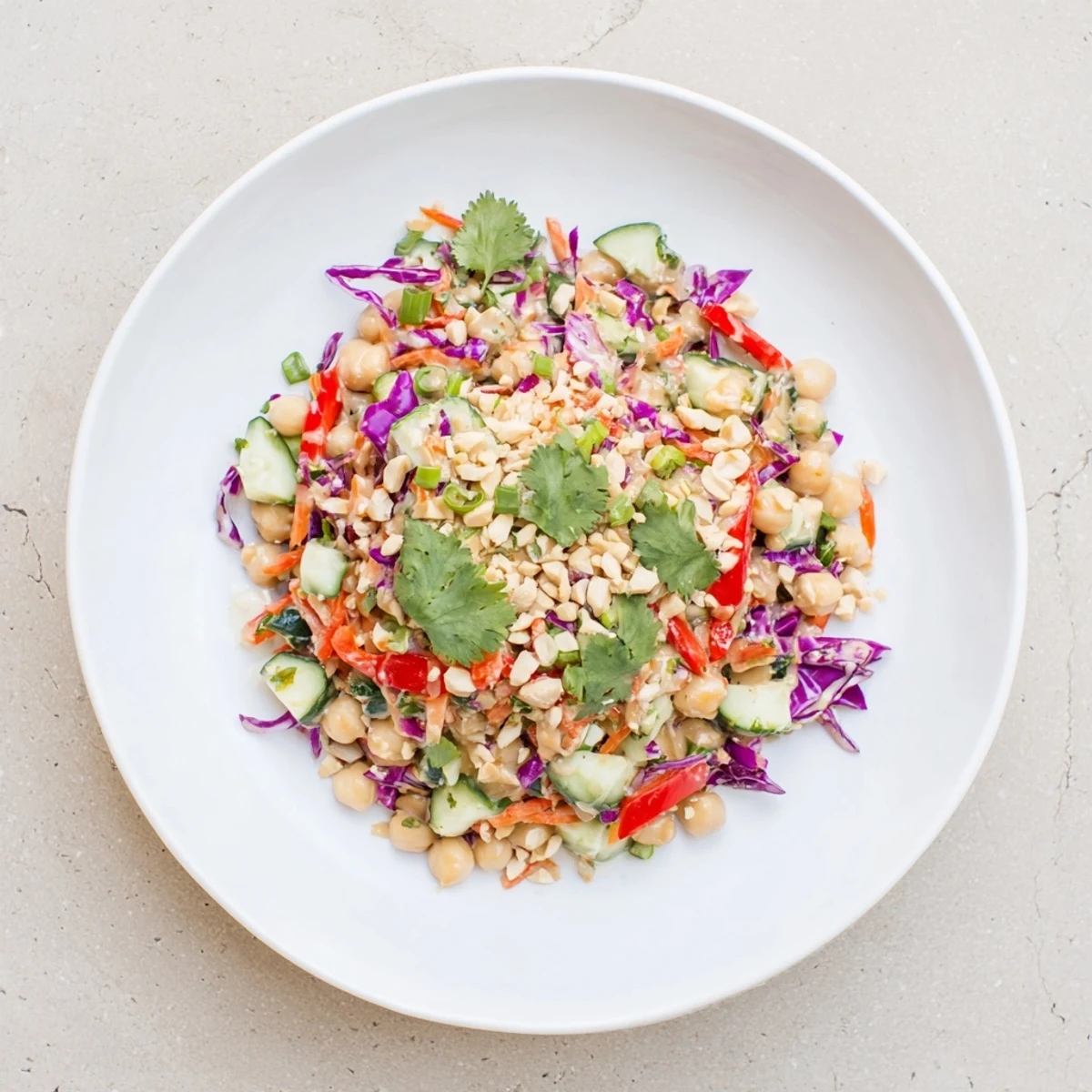 Colorful Crunchy Thai Chickpea Salad served in a bowl with fresh cilantro garnish